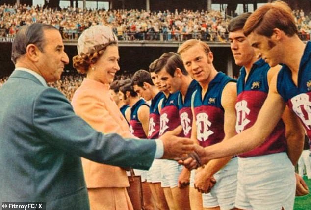 Pictured: The Queen meets the Fitzroy stars in the middle of the MCG.