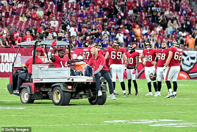 Godwin was carted off the field after having a cast placed on his apparently dislocated ankle.