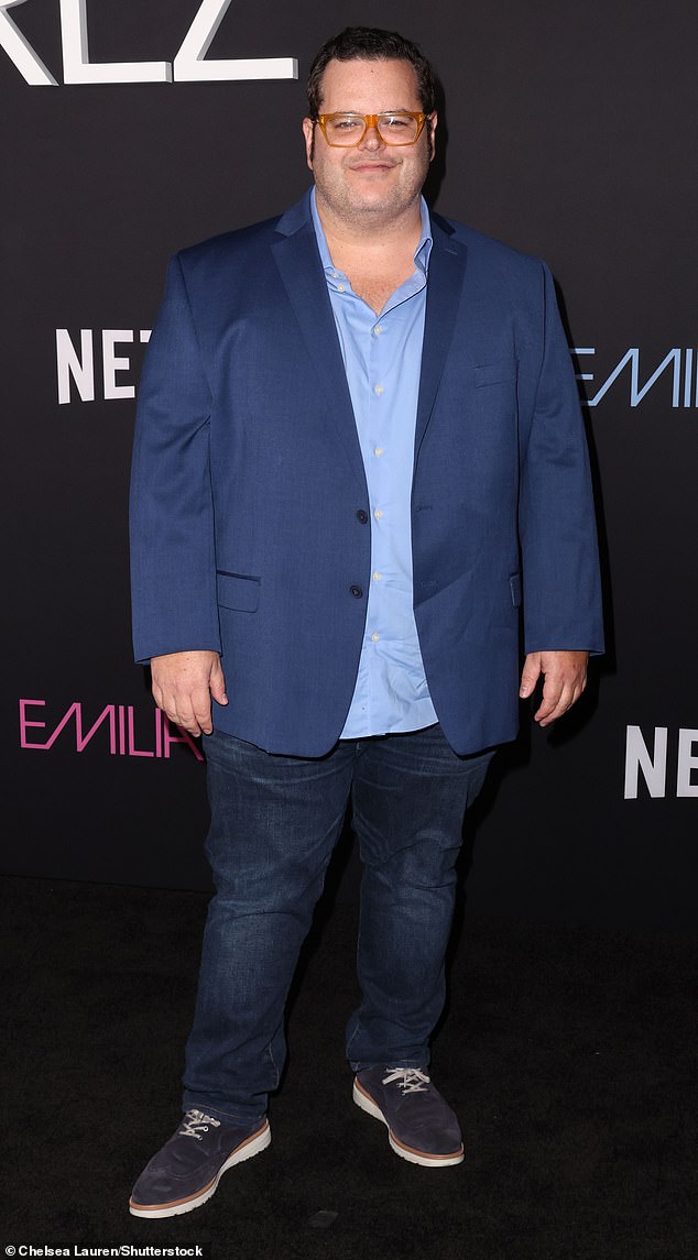 Actor Josh Gad, 43, sported a dark blue jacket over a lighter blue shirt and added dark jeans.