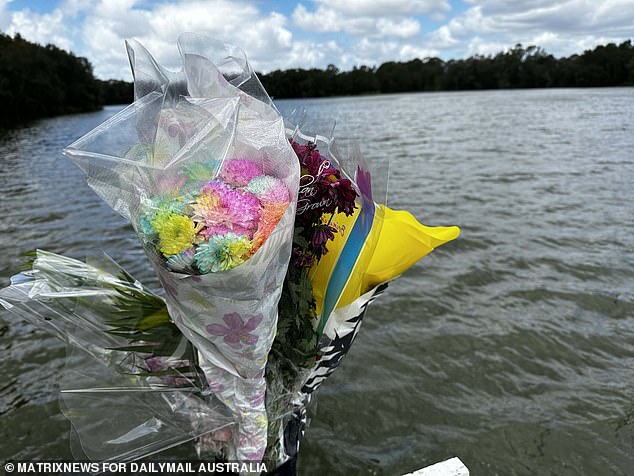 Pictured: Floral tributes left at the spot where Mrs Doan and her children died on Saturday.