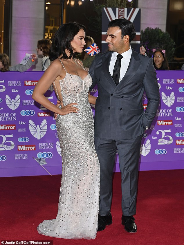 The duo put on a loving display as they posed for photos on the red carpet before entering the star-studded event.