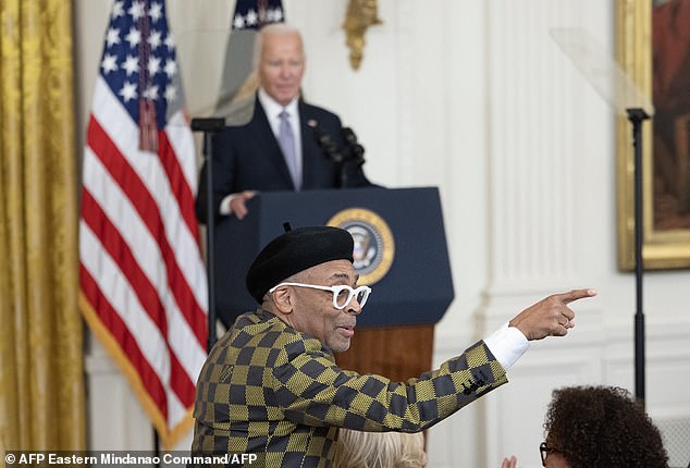 Spike Lee gestures as US President Joe Biden speaks during the National Arts and Humanities Reception on October 21.