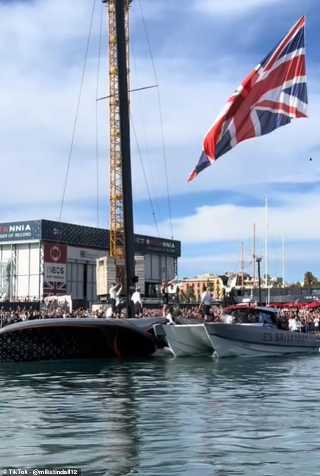 Video clips show Mike and Zara cheering on Ineos Britannia as the team's yacht took to the waves at the America's Cup on Saturday.