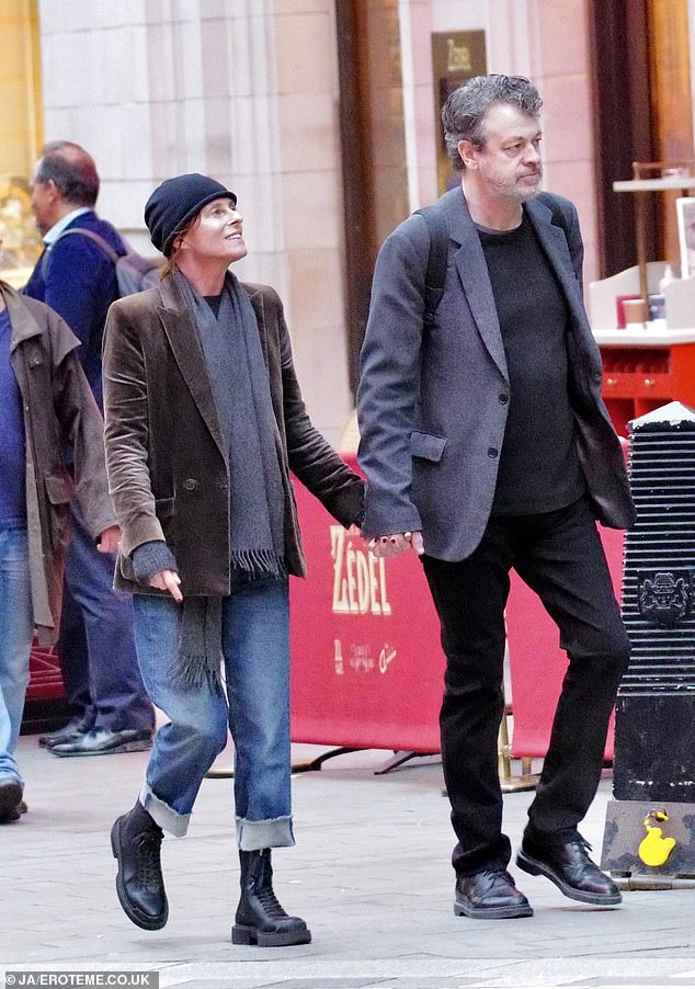 The iconic Mancunian singer looked unrecognizable as she enjoyed shopping on London's Regent Street with her husband, Ian Devaney.