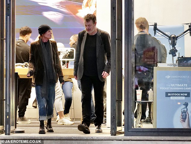 Meanwhile, her husband cut a smart-casual figure in a gray jacket and black jumper as they left the store.