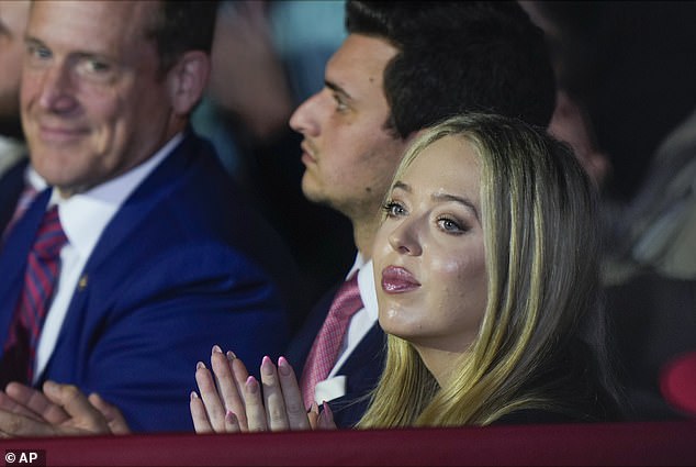 Tiffany Trump and her husband, Michael Boulos, listen as former President Donald Trump, Republican presidential candidate, speaks at a campaign rally.