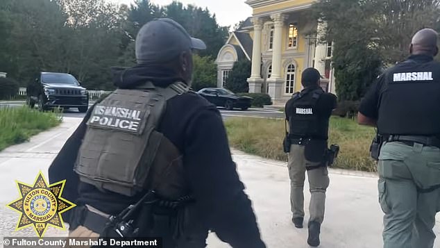 Video of the operation showed a bare house with minimal furniture, as deputies with long guns and shields swept the property.