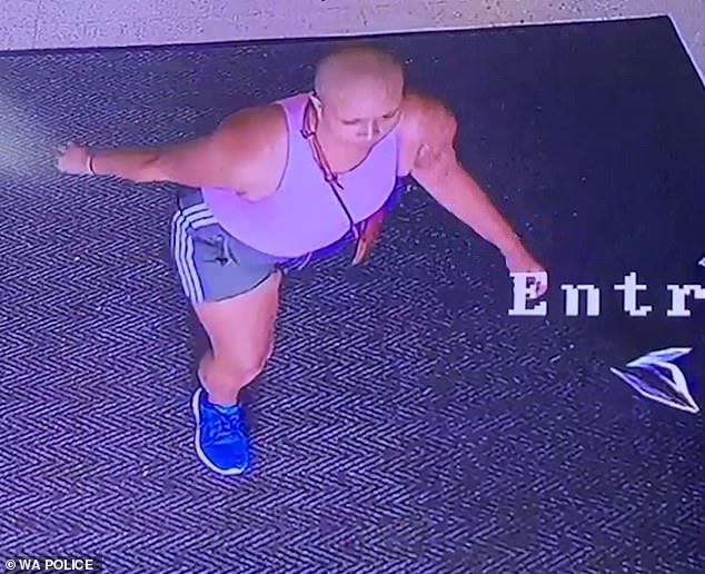 The woman (pictured), who was wearing a pink T-shirt and gray shorts with white stripes down the side, fled the scene and has not yet been located by police.