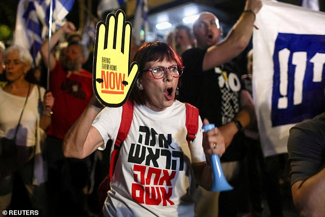 Protesters attend a demonstration against Israeli Prime Minister Benjamin Netanyahu's government and demand an agreement to release all hostages held in Gaza, during the conflict between Israel and Hamas, near Netanyahu's private residence in Jerusalem on June 20 .