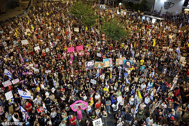 People protest against the government, demanding a ceasefire agreement and the immediate release of hostages kidnapped during the deadly October 7, 2023 attack by Hamas, in Tel Aviv, Israel.