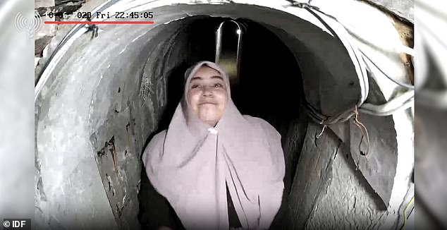 Footage of his wife appears to show her entering through the tunnel to the den, carrying a Birkin bag, the day before the horrendous tragedy. She is seen appearing to smile at the camera.