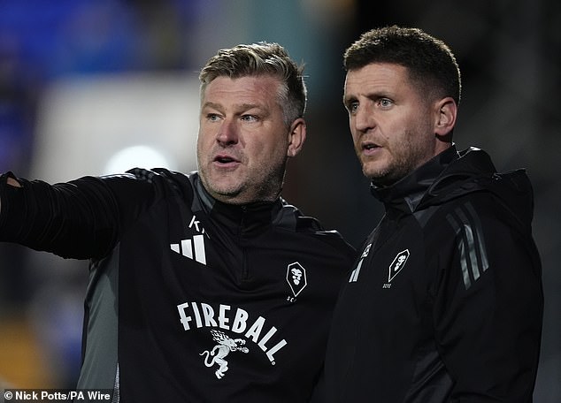 Karl Robinson's side (left) have made a slow start to the new campaign and are 18th after 11 games.