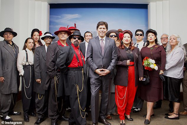 His opponent, Kevin de León (center), was also shaken by a leaked recording in October 2022, after he was heard making racist comments a year earlier.