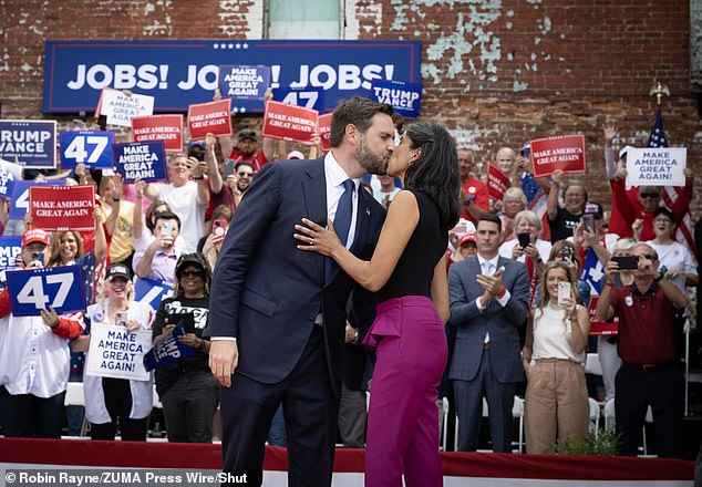 The Vances packing on the PDA with a kiss at a campaign rally in Rome, Georgia, on October 4.