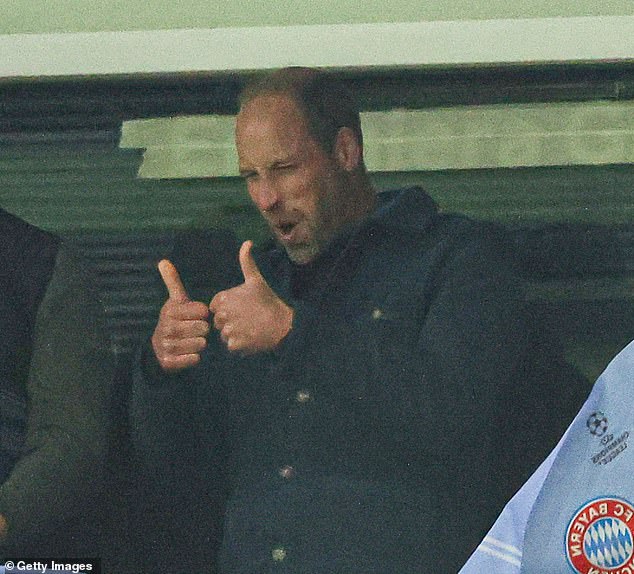 A jubilant William could not contain his emotions as his team won the game 1-0 against all odds, giving a delighted thumbs up to another member of the crowd.