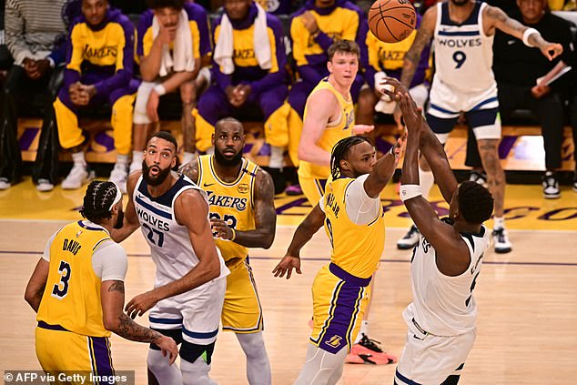 Bronny James plays defense in NBA debut as father LeBron watches closely