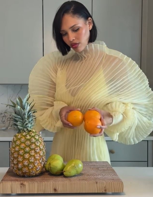 In a recent TikTok video (pictured), Nara made a replica of the Capri Sun multivitamin for her children in her kitchen while wearing a voluminous evening dress.