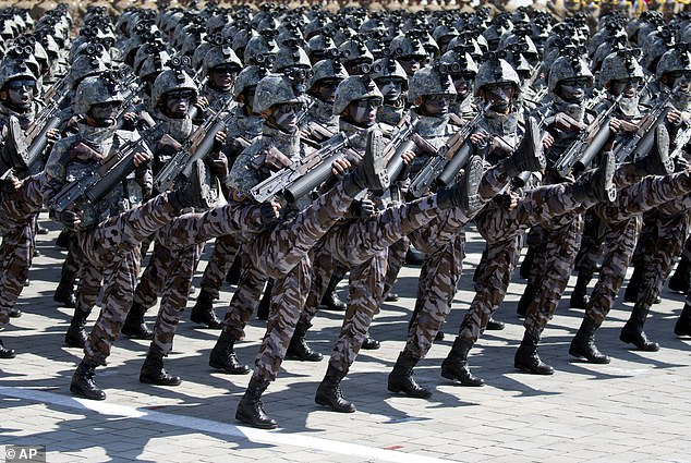 Troops march in a parade marking the 70th anniversary of the founding of North Korea in Pyongyang