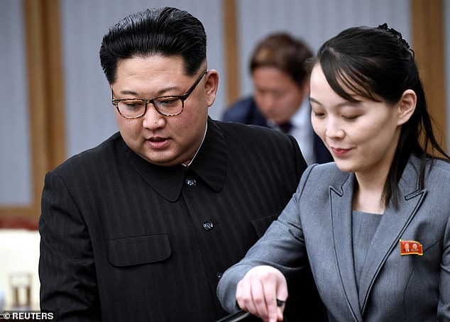 North Korean leader Kim Jong Un and his sister Kim Yo Jong attend a meeting in 2018