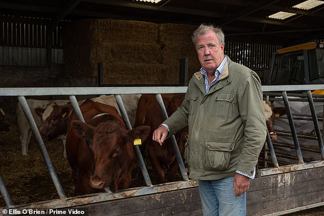 Jeremy (pictured on the farm) took to Instagram last year to document the former footballer's visit, delighting fans with the photo.