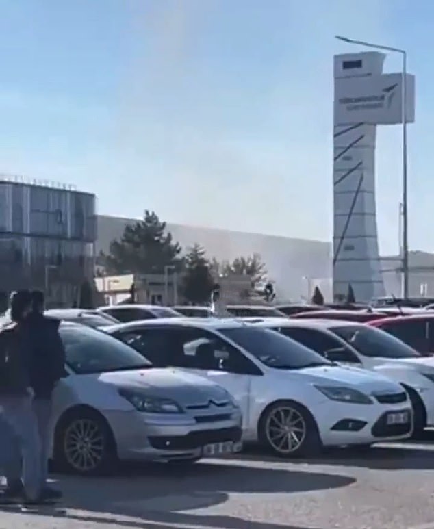 Video from the scene showed a column of smoke rising after explosions were heard.