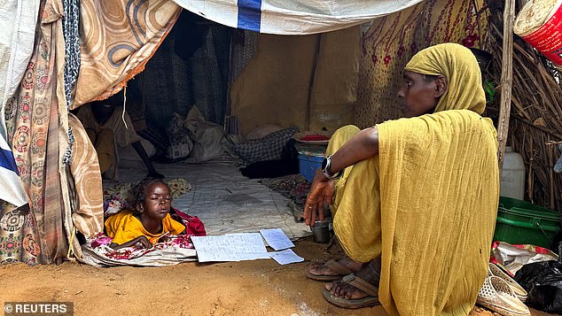 The UN estimates that 20,000 people have been killed and thousands injured since the conflict began. The war has also displaced more than 10 million people, including 2.4 million who fled to neighboring countries and other nations. A displaced Sudanese woman rests inside a shelter in Zamzam camp, northern Darfur.