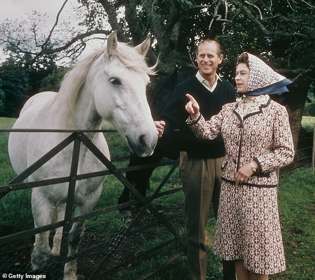 Queen Elizabeth and Prince Philip are photographed on a farm on the Balmoral Estate during their Silver Wedding anniversary year in 1972.