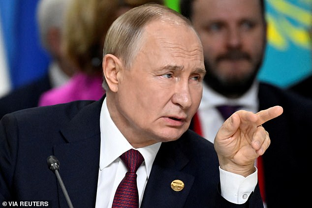 Russian President Vladimir Putin gestures during the expanded format meeting of the BRICS summit in Kazan, Russia, on October 23.