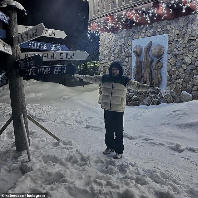 Another image showed Liam joking in the snow - holding out his hands next to a multi-pronged sign.