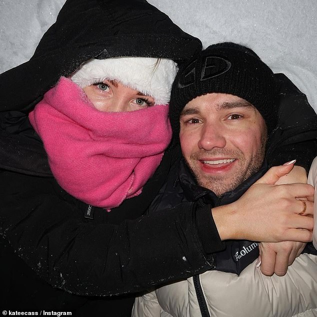 Another photo showed the devoted couple holding each other while wrapped in the snow.