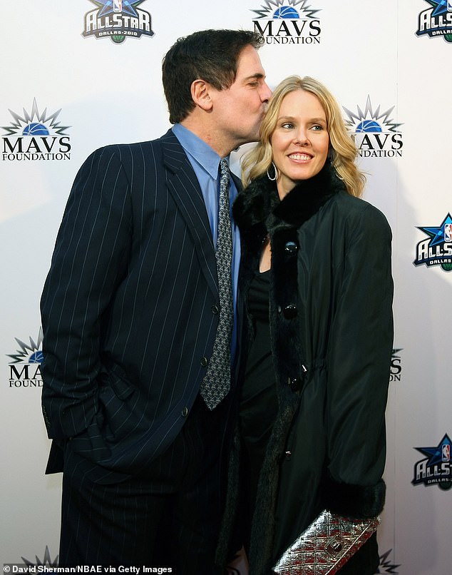 Businessman Mark photographed with his wife of 22 years, Tiffany Stewart, in 2010.