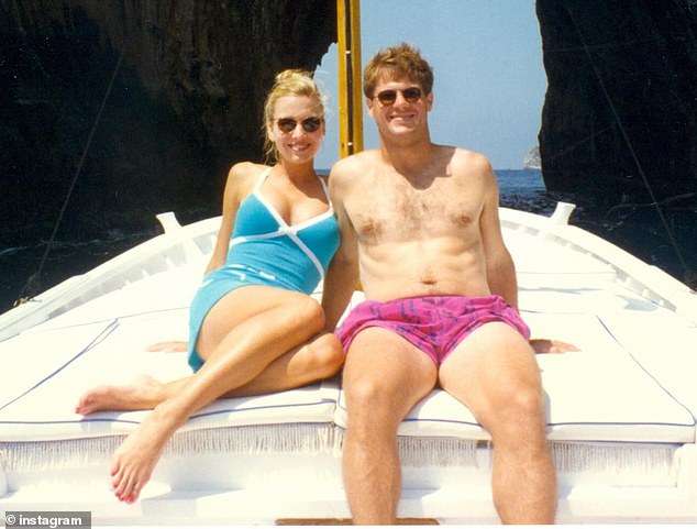 The couple sitting on a boat, with Tavia sporting a turquoise blue one-piece swimsuit and matching skirt, look almost identical to their two heir daughters.