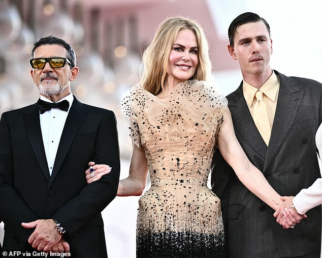 While Harris plays her lover, Antonio Banderas, 64, plays her husband; Nicole pictured with Antonio (left) and Harris (right) at the Venice Film Festival premiere in August.