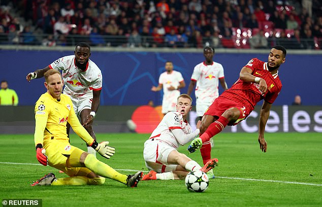 Former Reds stopper Peter Gulacsi makes a series of saves to keep Leipzig in contention.