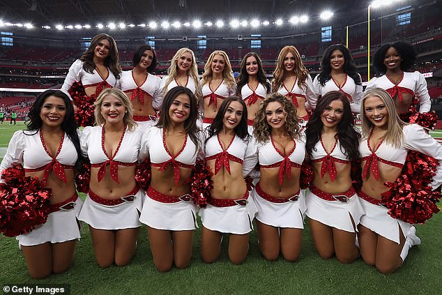 The Arizona Cardinals cheerleaders pose together after their season opener.