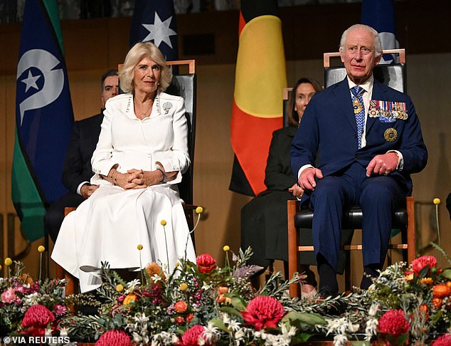 King Charles (pictured right) sits with Queen Camilla during the reception interrupted by Senator Thorpe.