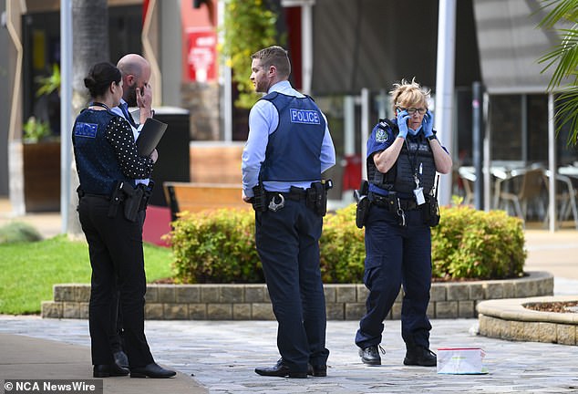 The alleged attack unfolded in front of shocked shoppers and staff. In the photo the police appear at the scene.