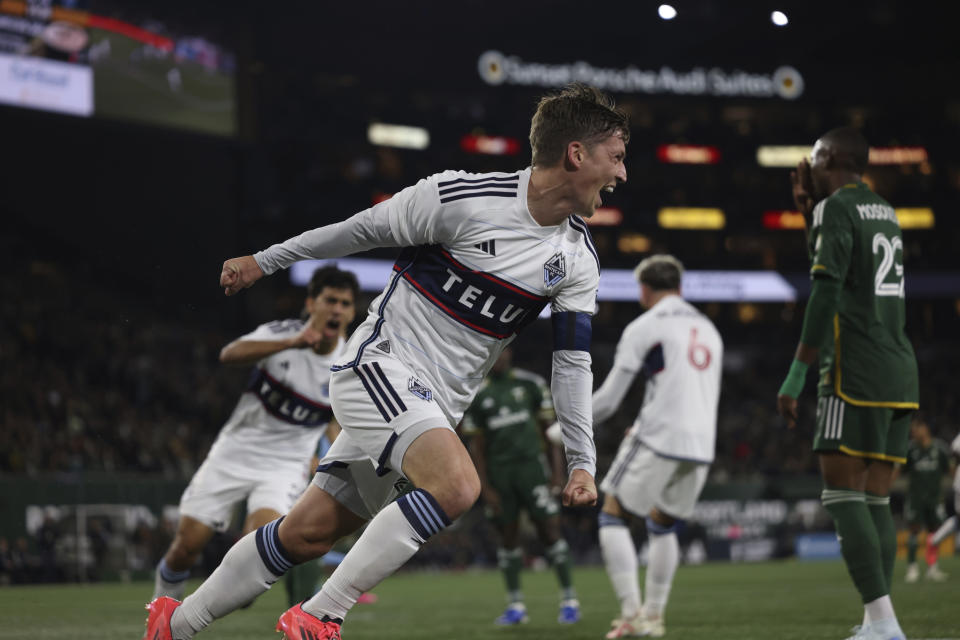 Ryan Gauld celebrates one of his three goals. (Howard Lao/AP Photo)