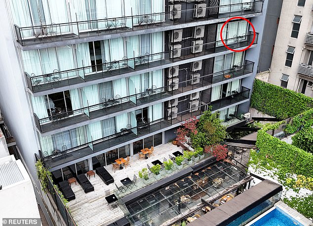 The hotel balcony from which Liam Payne fell to his death yesterday in Buenos Aires, Argentina, is surrounded by a circle.