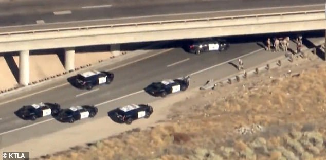 The car spun and spun several times before finally stopping after hitting a concrete pillar under an overpass.