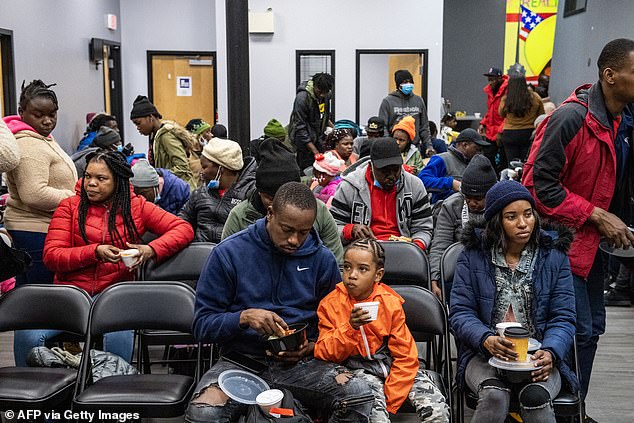 Although more than 2,000 miles from the southern border, Massachusetts has received about 50,000 new arrivals since January 2021. Migrants are pictured at the La Colaborativa day shelter in Chelsea, Massachusetts.