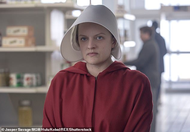 One woman said she previously voted in a Handmaid's Tale costume in 2016 and 2020, when Trump ran, and planned to wear it again, as seen above on Elizabeth Moss.