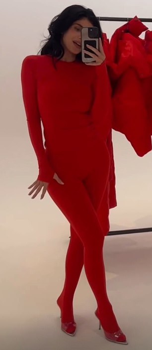 In a new video he modeled the new line in scarlet red.