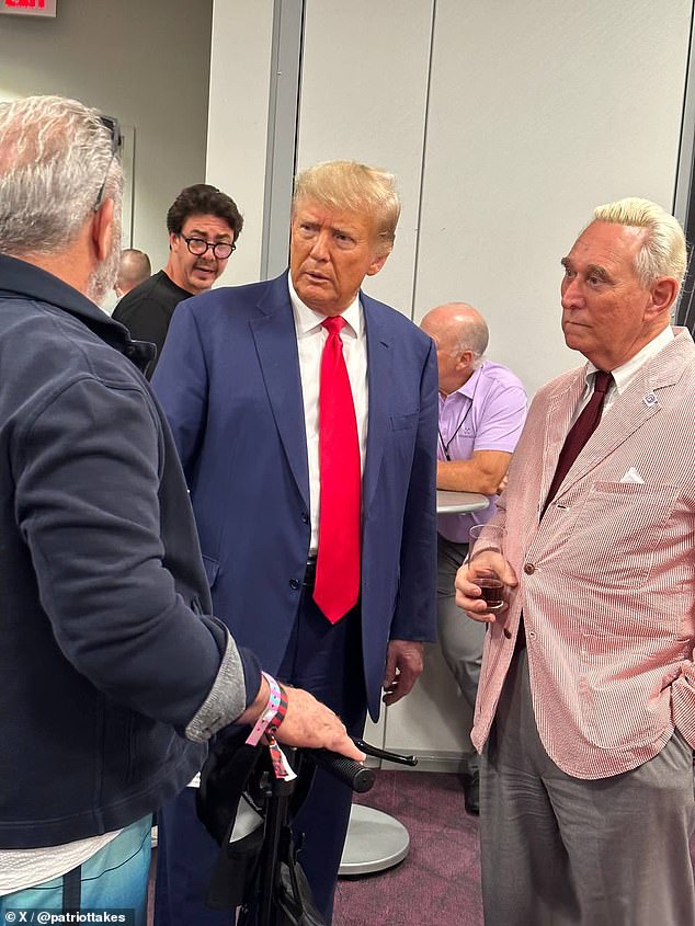 Donald Trump speaking with Mel Gibson and Roger Stone