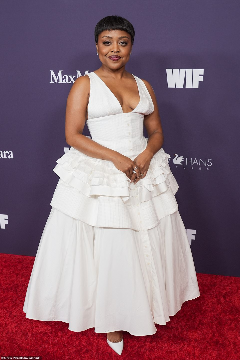 Quinta Brunson, 34, wowed in a low-cut white dress with an elegant ruffled skirt.