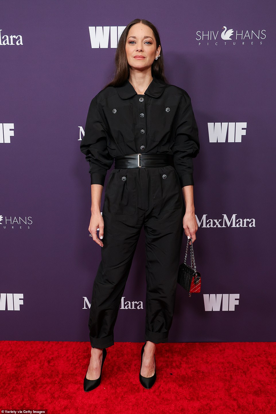 Marion Cotillard left jaws dropping as she stepped onto the red carpet wearing an elegant black belted jumpsuit.