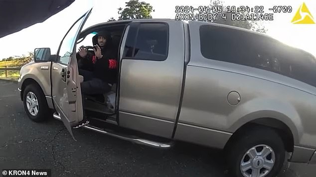 Body camera footage of the incident showed Faison with his hands up inside a truck as Officer Knea pulled out a gun and told him to get out of the vehicle.