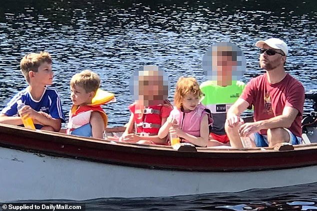 The couple's eldest son, 15 years old (in green), is accused of killing his parents, two brothers and one of his two sisters. The surviving sister, 11 years old (in red), was shot twice and is now in the hospital. The brothers are photographed with their father in happier times.