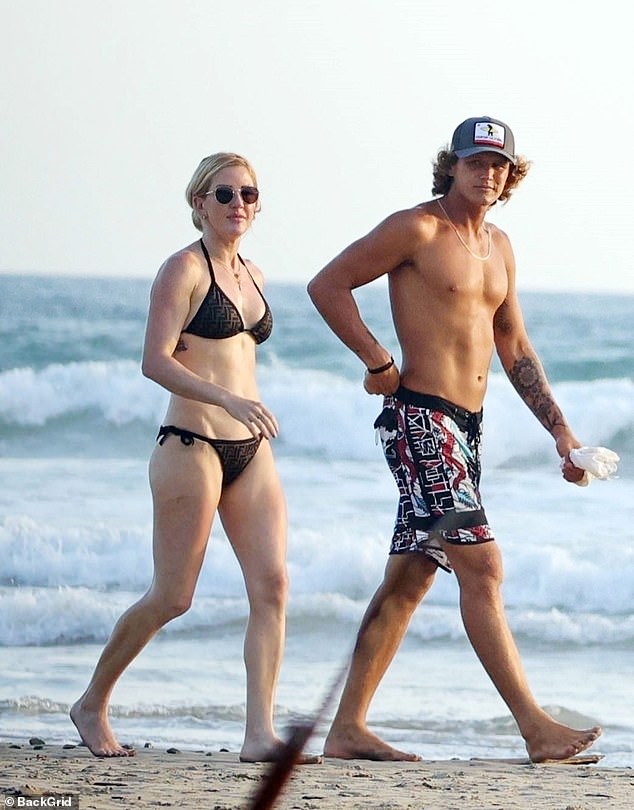 The star-studded outing came after Ellie's fling with handsome surf instructor Perez Armando, who is eight years her junior, ultimately failed (pictured in March).