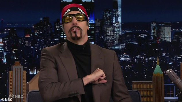 As the audience applauded, he first transformed into Ali G, complete with a sticky goat, red hat and glasses, when Fallon asked him to moderate a debate between Trump and Harris.